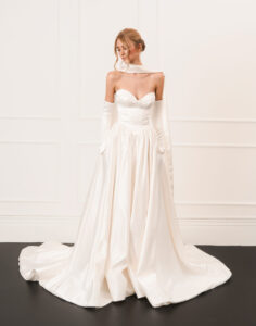 Guillermo Pharis Fall Winter 2026, strapless Satin Basque Waist wedding dress with scarf