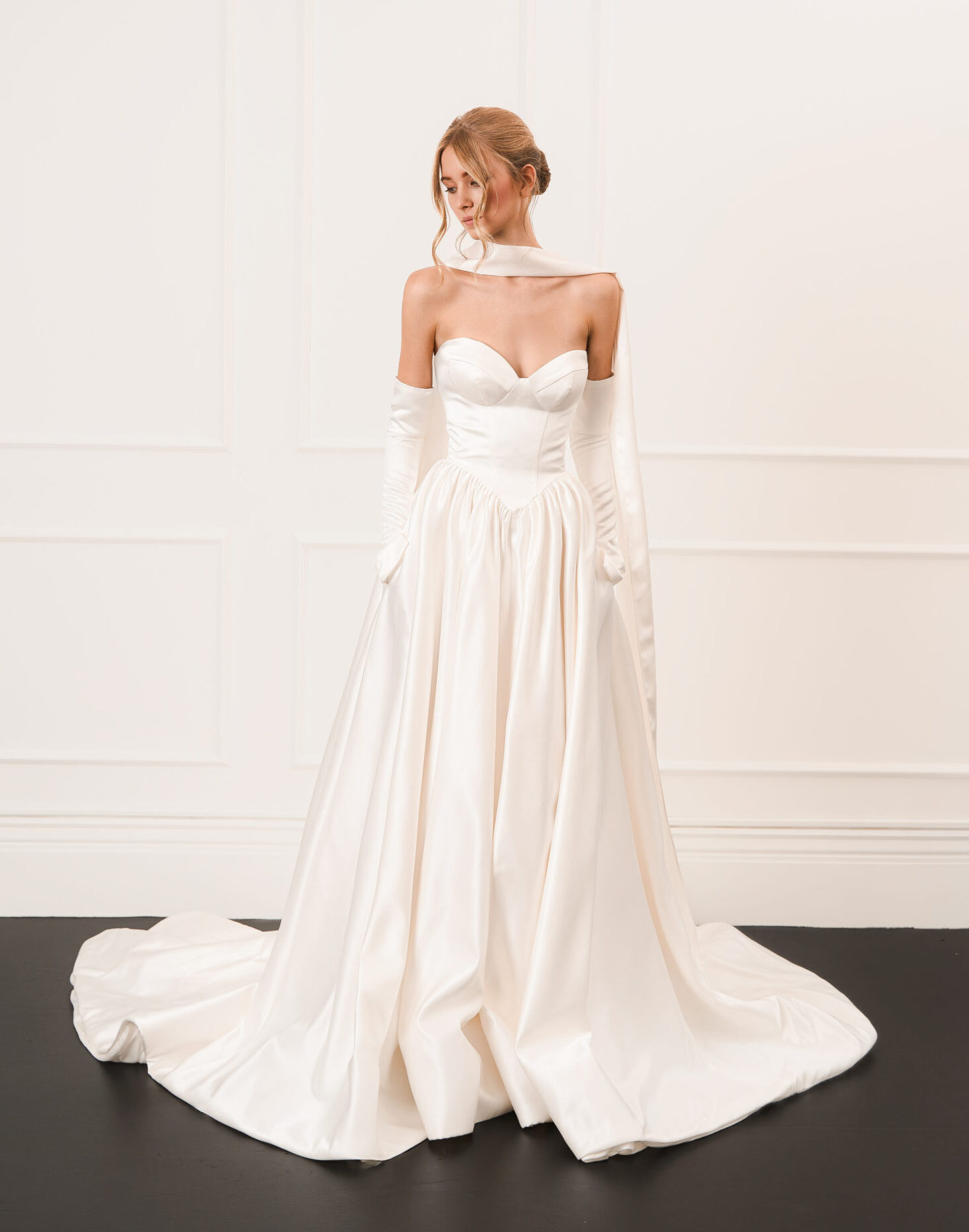 Guillermo Pharis Fall Winter 2026, strapless Satin Basque Waist wedding dress with scarf