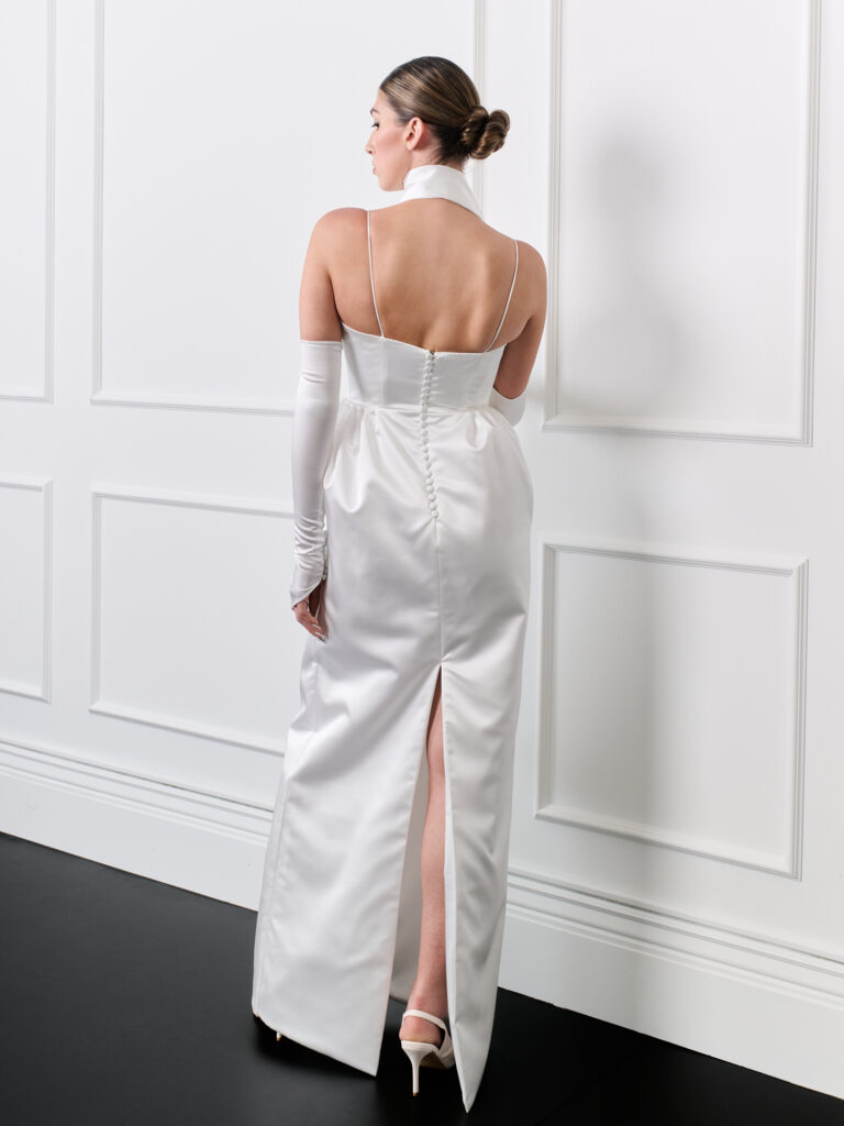 Italian Duchess satin column strapless wedding dress with spaghetti straps, detachable sleeves and spaghetti straps, pocket and slit in the back.