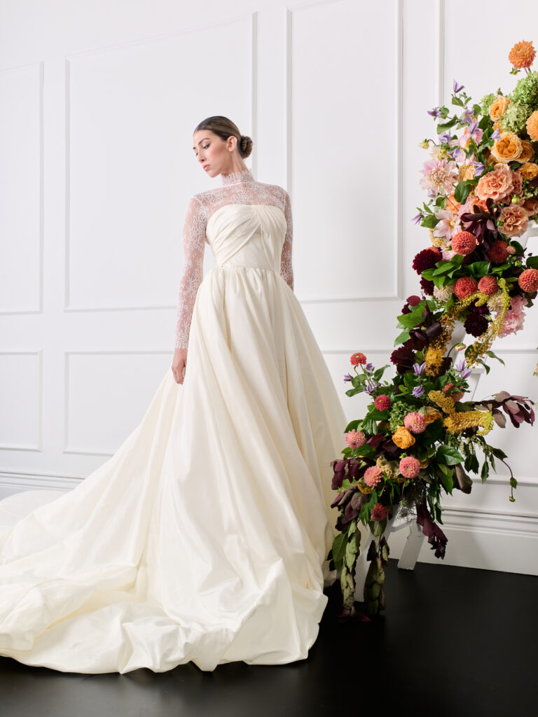Strapless pleated bodice Bubble hem silk blend taffeta Ivory wedding gown