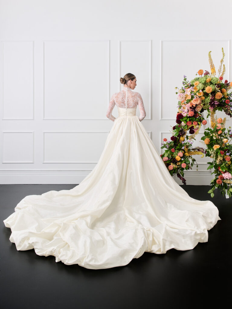 Strapless pleated bodice Bubble hem silk blend taffeta Ivory wedding gown